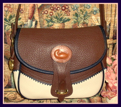 Required Reading Before Purchasing a Vintage Dooney & Bourke from our Vintage Store:   •	All Dooney Handbags and Accessories are Pre-Owned unless they are listed as New •	At our AdorePurses Vintage Dooney Bag store, we provide many pictures of handbags with many views.  Photographing handbags is a bit tricky so some will show a bag in a slightly darker or lighter shade. When this is the case, I try to note which picture is the closest color to the actual bag. I’m happy to say the majority of my Dooney Bag pictures very accurately depict the actual colors. •	All Dooney Pre-Owned Vintage items sold have at least some if not all of the following signs of use except those located in our New & Like New-Excellent Category: •	Brass Duck FOB’s and Brass Closure parts will show some signs of use •	Leather trim & piping will contain any/all of the following: darkening of leather, slight light discoloration in area such as corners of bag, small spot(s) of discoloration on strap/body/inside leather. •	All Dooney's are professionally & painstakingly cleaned and restored with top grade professional leather care products from London England’s finest Cobbler shops and my Vintage Dooney Bourke bags are not sold with broken parts or rips or odd odors such as perfumes or smoke. •	Bargain Bags:. The reason each bag appears in the Bargain Bags section will be clearly stated in the description. I want you to be very happy with your bag, please ask questions first. There are no returns on Bargain Bags. •	Accurate descriptions are given & all major recognizable signs of use are noted. •	Ask Questions before purchasing as I want you to be thrilled with your purchase!  email me at vintagedooney@hotmail.com