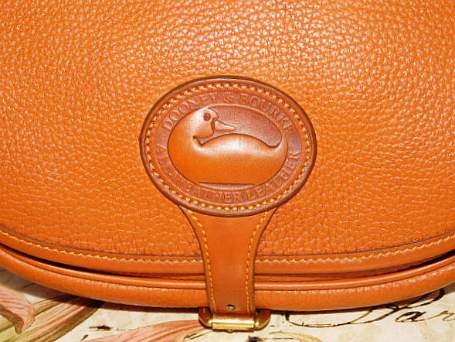 Vintage Dooney Bourke All-Weather Leather Saddle Bag