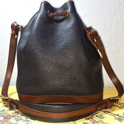 vintage dooney bourke   Dooney and Bourke  All-Weather Leather  Drawstring  Shoulder Bucket Bag  Padded Shoulder Strap