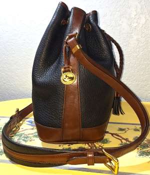 vintage dooney bourke   Dooney and Bourke  All-Weather Leather  Drawstring  Shoulder Bucket Bag  Padded Shoulder Strap