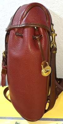 Vintage Dooney Bourke All-Weather Leather  Rouge and British Tan Drawstring Back Pack 