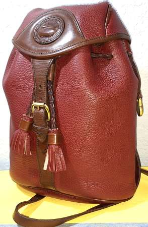 Vintage Dooney Bourke All-Weather Leather  Rouge and British Tan Drawstring Back Pack 