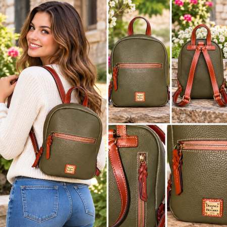 This compact backpack, made from rich pebble leather, is perfect for vacation, a day in the city, or the commute to work or school. It is truly in mint condition as it was worn for a vacation only. It retains 95% of its original semi-firm shape. The Zip Top Backpack offers a surprisingly roomy interior. The 2 exterior zip pockets offer more options & space for quick use. Made with Dooney and Bourke renown quality and attention to details such as the quick-retrieve key hook strap inside and braided zipper pulls for easy use and style. This mini backpack comfortably fits a small tablet, continental wallet, phone, keys, and sunglasses case, with space for a compact notebook or cosmetic pouch. Interior slip and zip pockets provide convenient organization for smaller essentials. Dual adjustable straps allow for a comfortable, customizable fit, and a top handle provides an alternative carrying option. Ideal for travel, weekend outings, or everyday wear, this backpack combines hands-free convenience, designed to keep essentials securely close at hand. This compact backpack, made from rich pebble leather, is perfect for vacation, a day in the city, or the commute to work or school. It is truly in mint condition as it was worn for a vacation only. It retains 95% of its original semi-firm shape. The Zip Top Backpack offers a surprisingly roomy interior. The 2 exterior zip pockets offer more options & space for quick use. Made with Dooney and Bourke renown quality and attention to details such as the quick-retrieve key hook strap inside and braided zipper pulls for easy use and style. This mini backpack comfortably fits a small tablet, continental wallet, phone, keys, and sunglasses case, with space for a compact notebook or cosmetic pouch. Interior slip and zip pockets provide convenient organization for smaller essentials. Dual adjustable straps allow for a comfortable, customizable fit, and a top handle provides an alternative carrying option. Ideal for travel, weekend outings, or everyday wear, this backpack combines hands-free convenience, designed to keep essentials securely close at hand.