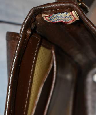 Dooney and Bourke Leather Bayou Flap Bag