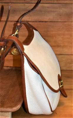 Vintage Dooney and Bourke  Dooney and Bourke All-Weather Leather  Cavalry Saddle Bag