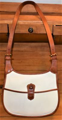 Vintage Dooney and Bourke  Dooney and Bourke All-Weather Leather  Cavalry Saddle Bag