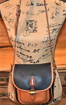 Vintage Dooney and Bourke Outback Collection  Dooney and Bourke All-Weather Leather  Medium Single Pocket Outback  Outback Saddle Bag